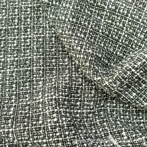 Wollboucle mit Slubgarnstoff kariert